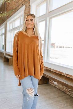 We're bringing it back to the basics with our Quinn Dolman V-Neck Tunic! Our tunic features a v-neckline, dolman style long sleeves, a semi-loose fit, and a high-low hem. With its super soft buttery fabric our top is a must have in every closet this season! Wear it with your favorite jeans or leggings for a comfy yet stylish look! Ash Grey, High Low Hem, Basic Style, The Basics, Favorite Jeans, High & Low, High Low, Loose Fitting, Long Sleeves