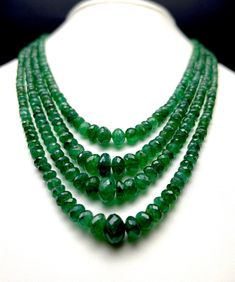 100% Natural Zambian Emerald faceted rondelle shape beaded necklace with adjustable silk cord closure Details : Gemstone - Natural Zambian Emerald Gross weight - 342.40 carats Net weight - 312.00 carats Strand - 4 Calibration of beads - 3.50 millimeters till 9.00 millimeters Length - 16.00 Inches ( Inner ) and 19.00 Inches ( Outer ) SKU - EMEFAC0010 100% NATURAL ZAMBIAN EMERALD FACETED RONDELLE SHAPE BEADS GREEN COLOR NECKLACE NOT HEATED NOT TREATED NOT DYED 100% ORIGINAL NATURAL EMERALD BEADS U Luxury Green Emerald Necklace With Round Beads, Luxury Emerald Necklace With Polished Beads, Luxury Polished Emerald Bead Necklace, Green Rondelle Necklace With Faceted Beads, Emerald Faceted Beaded Necklaces, Rondelle Emerald Gemstone Beads Necklace, Emerald Rondelle Gemstone Bead Necklaces, Emerald Rondelle Gemstone Beads Necklace, Emerald Rondelle Faceted Beads Jewelry