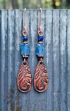 These engraved copper earrings are made with Kyanite and lapis gemstones.  Part of the "Dulce Vida" collection - known for its organic shapes and bohemian flavor, these charms evoke swirling vines and leaves. These earrings are 2 inches  long and a half inch wide. They weigh 2.5 grams. The Copper earwires are extra long for stability. All my jewelry comes gift boxed with a custom Shelly Mariposa Design butterfly card ready for gift giving, whether it is a gift for you or someone special. Your sa Copper Earrings Handmade, Kyanite Earrings, Blue Gemstone Earrings, Design Butterfly, Butterfly Card, Natural Stone Earrings, Blue Kyanite, Earrings Blue, Earrings Boho