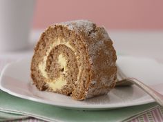 a piece of cake sitting on top of a white plate