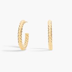 Go for luxurious style with these bold hoop earrings featuring gleaming 14k yellow gold design. The thicker style features twisted texture to give them a classic rope-inspired look. Blue Nile, Metal Earrings, Gold Design, Jewelry Earrings, Hoop Earrings, Yellow Gold, Texture, Yellow, Gold