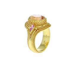 Kent Raible 18 Karat Gold Pink Sapphire and Tourmaline Ring with Granulation For Sale at 1stDibs Luxury Pink Multi-stone Sapphire Ring, Luxury Pink Multi-stone Ruby Ring, Luxury Pink Sapphire Ring With Gemstone Accents, Pink Sapphire Ring With Gemstone Accents, Luxury Pink Sapphire Gemstone Ring, Heirloom Pink Jewelry With Center Stone, Luxury Pink Morganite Jewelry, Luxury Pink Topaz Ring, Exquisite Pink Sapphire Gemstone Rings