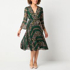 Feel glamorous in the cooler months with this women's fit and flare midi dress from Danny & Nicole. Made from a soft floral-print chiffon, it has a v-neckline with 3/4 sleeves, a belted waist and a flowy pleated skirt for a feminine touch. Pair yours with heeled sandals.Included: 1 Belt(s)Features: Pleated, Hidden ClosureClosure Type: ZipperNeckline: V NeckSleeve Length: 3/4 SleeveSleeve Style: Fitted SleeveApparel Length: 45 Inches - Back, 46.5 Inches - FrontDress Length: Midi LengthFiber Conte Flare Dresses, Floral Print Chiffon, Floral Print Midi Dress, Skirt Fits, Soft Floral, Pleated Midi Skirt, Fit N Flare Dress, Print Chiffon, Petite Dresses