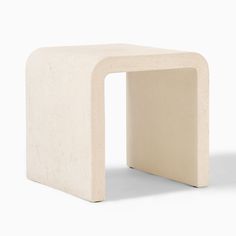 a small white table with a square shaped design on the top and bottom, sitting in front of a white background