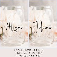 two mason jars with names and flowers in them