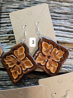 Brown Dangle Flower Earrings For Pierced Ears, Brown Bohemian Drop Flower Earrings, Brown Bohemian Concho Earrings, Brown Hand Tooled Dangle Earrings, Brown Hand Tooled Drop Earrings, Hand Tooled Brown Dangle Earrings, Rustic Hand Tooled Leather Earrings, Rustic Brown Hand-tooled Earrings, Rustic Brown Hand Tooled Earrings