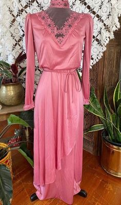 "Vintage 70s does Victorian, pink rose polyester maxi dress with lace neck/chest, fitted waist and matching tie. 100% polyester. Excellent vintage condition! No stains or holes.  Size: Not tagged. BEST FIT S. Always refer to measurements for more accurate sizing. Measurements taken laying flat/Double number where applicable: STS: 16\" PTP: 20\" Waist: 15\" Hip: 22\" SL:18\" inseam, 7\" width L: 56\" ALL SALES ARE FINAL SO PLEASE DOUBLE CHECK THE MEASUREMENTS PRIOR TO BUYING AND DON'T HESITATE TO REACH OUT IF YOU HAVE ANY QUESTIONS!  All items are vintage/preloved and may have small imperfections. This should be expected for secondhand clothing. ALL MAJOR FLAWS WILL BE NOTED IN THE DESCRIPTION AND PHOTOGRAPHED." Double Numbers, Lace Neck, Dress With Lace, Dress Clothes For Women, Second Hand Clothes, Vintage 70s, Pink Rose, Lace Dress, Dress Outfits