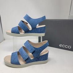 Brand New And No Flaws Womens Size 10-10.5, Eu 41 These Are Leather They Are Blue Casual Blue Wedge Sandals With Removable Insole, Blue Synthetic Wedge Sandals With Ankle Strap, Blue Synthetic Ankle Strap Wedge Sandals, Casual Light Blue Wedge Sandals, Blue Leather Wedge Sandals With Round Toe, Blue Wedge Heel Sandals With Removable Insole, Blue Leather Wedge Sandals With Ankle Strap, Blue Wedge Sandals With Removable Insole, Blue Leather Wedge Sandals For Spring