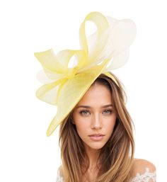 Hats By Cressida Kentucky Derby Hats & Ascot Fascinators Brita Saucer Fascinator Lemon Yellow and Ivory Fascinator Hat  Beautiful yellow and ivory crin loops and bow on a yellow sinamay base Measures about 12 inches wide This yellow and ivory headpiece is mounted with a matching headband. If you prefer a headband to match your hair, please make a note at check out what colour headband you want. The Brita Saucer Disc Fascinator Hat is perfect for all your formal occasions! Whether you're attendin Yellow Fascinator, Ivory Fascinator, Kentucky Derby Fascinator, Womens Tea, Derby Fascinator, Base Trim, Cocktail Formal, Tea Party Hats, Kentucky Derby Hats