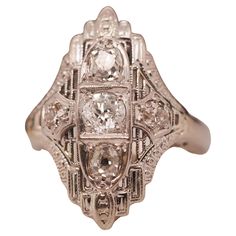 Year: Item Details: Ring Size: 8.5 Metal Type: 14K White Gold [Hallmarked, and Tested] Weight: 4.9grams Diamond Details: .70ct total weight, Old European Brilliant, G-H Color, VS Clarity Band Width: 2.32mm Condition: Excellent Price: $1400 Art Deco Gold Art Deco, Gold Art, Jewelry Rings Engagement, Amazing Jewelry, Diamond Rings, Types Of Metal, Diamond Ring, Jewelry Rings, Ring Size