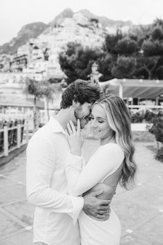 black and white photo of couple embracing each other