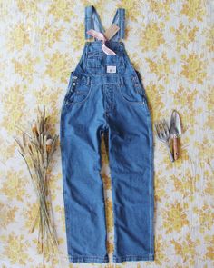 The perfect overalls for any task. Soft brushed denim pairs with a vintage 90's fit, traditional overall design & stitch detailing. Sure to be your favorite overalls yet! Easy fit. Color: Denim 100% Cotton Hand or machine wash cold X-Small: Bust Open, Waist 30", Hips 40", Inseam 30"Small: Bust Open, Waist 32", Hips 41", Inseam 30"Medium: Bust Open, Waist 33" Hips 42" Inseam 30.5"Large: Bust Open, Waist 34", Hips 43", Inseam 31"X-Large: Bust Open, Waist 35", Hips 44", Inseam 32" Relaxed Fit Bib Front Denim Jeans, Relaxed Fit Denim Jeans With Bib Front, Medium Wash Relaxed Fit Bib Front Jeans, Spring Utility Jeans With Bib Front, Light Wash Denim Overalls For Fall, Fall Medium Wash Bib Front Denim Jumpsuit, High Rise Cotton Overalls With Pockets, Medium Wash Relaxed Fit Denim Jumpsuit With Bib Front, Fall Medium Wash Overalls With Pockets