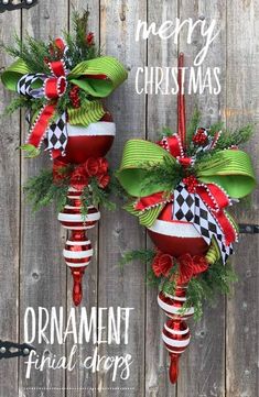 two red and green christmas ornaments hanging on a wooden fence with the words merry christmas ornament final drops