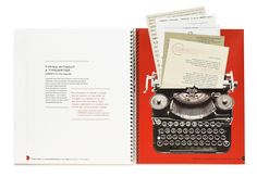 an open book with a typewriter on it