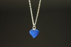 "Minimalist heart pendant necklace made especially as a Valentine's Day Gift. This dainty necklace is made with lapis lazuli heart pendant and sterling silver flat cable chain. All the findings ( lobster, head pins, and jump rings ) are in sterling silver as well. Perfect unique gift for her , for women, wife, loved ones or yourself. Due to the handmade nature of this Lapis stones, shapes and color may slightly differs from the picture making them uniquely yours. Color : Genuine Lapis Lazuli heart Finish : Everything is in sterling silver. Length : Please select your choice of length. For more choice on my Valentine Gifts please, refer to the link below: https://www.etsy.com/shop/NtikArtJewelry?ref=seller-platform-mcnav To visit my shop \"NtikArtJewelry\" : https://www.etsy.com/shop/NtikAr Handmade Heart Charm Necklace For Everyday, Handmade Minimalist Heart Necklace For Valentine's Day, Simple Nickel-free Charm Necklaces As Gifts, Simple Nickel-free Charm Necklaces For Gifts, Simple Nickel-free Charm Necklace As Gift, Minimalist Heart Beads Necklace As Gift, Minimalist Heart Beads Necklace For Gift, Simple Heart Necklace For Gift, Minimalist Handmade Heart Necklace For Everyday