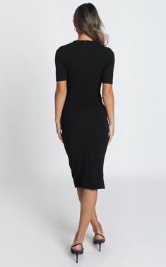 Our high neck, mid sleeve tall tales dress is so versatile, perfect for a day at work followed by an evening out. The split at the centre adds a sophisticated and sexy touch. Teamed with nude or black pump heels and a clutch to achieve the complete look.- Made With 100% Polyester u0026 Love- Care For Me; Cold Hand Wash Only, Cool Iron, Do Not Soak, Do Not Tumble Dry- Midi Length; 110Cm / 43in- Plastic Invisible Zipper On The Center Back- Medium Stretch- Leah is wearing size 8 AUS / 4 US / 8 UK / Black Half Sleeve Midi Dress For Work, Chic Mid-length Bodycon Dress For Work, Black Midi Dress With 3/4 Sleeves For Office, Fitted Bodycon Dress For Business Casual, Midi Length, Fitted Half Sleeve Midi Dress For Work, Fitted Midi Dress With Half Sleeve For Work, Stretch Midi Dress For Office Wear, Flattering Midi Bodycon Dress For Work, Flattering Midi-length Bodycon Dress For Work