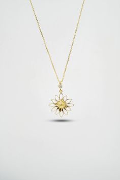 14 K Gold Daisy Necklace This Fine Jewelry Gold Necklace is ideal for the special woman in your life. The beautiful 14 K Gold Daisy Necklace displays a stunning and delicate daisy made of gold. Each petal is intricately crafted to create a gorgeous daisy that is sure to make an extraordinary statement. The gentle curves of the daisy will perfectly frame her face, and its shimmering gold is sure to catch everyone's eye. This stunning piece of fine jewelry is both bold and delicate, perfect for an 14k Gold Flower Pendant Necklace As Gift For Mom, 14k Gold Flower Pendant Necklace For Mom, Yellow Gold Flower Pendant Necklace For Mom, White Gold Plated Flower Pendant Jewelry, Handmade Yellow Gold Flower-shaped Necklace, Handmade Yellow Gold Flower Shaped Necklace, Handmade Yellow Gold Flower Necklace, Fine Jewelry White Flower Necklace, White 14k Gold Necklace For Her