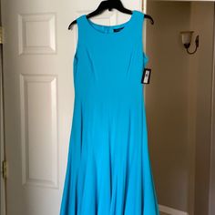 Turquoise. Fitted Waist. Never Worn. Would Be Great For Work Or A Wedding. Elegant Fitted Turquoise Maxi Dress, Fitted Turquoise Midi Dress For Party, Sleeveless Blue Midi Dress For Wedding, Turquoise Fitted Maxi Dress For Spring, Elegant Sleeveless Midi Dress In Turquoise, Fitted Turquoise Maxi Dress For Spring, Elegant Turquoise Sleeveless Midi Dress, Elegant Sleeveless Turquoise Midi Dress, Blue Fit And Flare Formal Dress