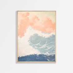 a painting hanging on the wall next to a vase with an orange and blue flower in it