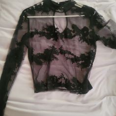 Black Sheer Shirt (Never Worn) Edgy Black Sheer Top, Trendy Black Sheer Blouse, Edgy Black Tops For Night Out, Black Top For Night Out In Spring, Black Top For Night Out, Fall Black Sheer Blouse, Fall Sheer Black Blouse, Sheer Black Blouse For Fall, Trendy Black Tops For Date Night