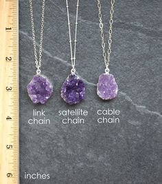 Amethyst Druzy pendant on a custom length Sterling Silver chain. These are smaller more petite sized Druzy pendants, larger ones available here http://etsy.me/2hIe7JRCustomize your necklace to your preferred chain length. Select from 3 chain designs: cable, link or satellite. Brazilian Amethyst is known for having the richest color and incredible sparkle. Each druzy pendant has a unique crystallization formations. These are chunky Amethyst pendants that have a silverplated edging around the pend Lavender Stone Jewelry Gift, Purple Raw Stone Crystal Pendant Necklace, Purple Amethyst Pendant Crystal Necklace, Purple Necklace With Large Stone For Gift, Purple Amethyst Crystal Necklaces With Natural Stones, Purple Amethyst Necklace With Raw Stone, Purple Amethyst Gemstones For Jewelry Making, Round Amethyst Crystal Necklaces With Natural Stones, Amethyst Crystal Necklaces With Natural Stones