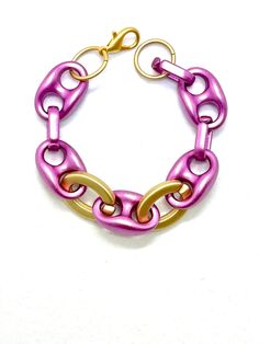 Lavender Guzzi Bulky Bracelet - Bulky Guzzi Links Plastic Bracelets - Matte finish - Bright Lavender Magenta and Golden oxide color links - Length: 7.5”, 8”, 8.5” Pink Chain Bracelet With Lobster Clasp, Modern Purple Bracelet As Gift, Purple Metal Bracelets For Party, Purple Metal Bracelet For Party, Adjustable Purple Chain Bracelet, Plastic Bracelets, Online Jewelry Store, Lavender, Handmade Jewelry