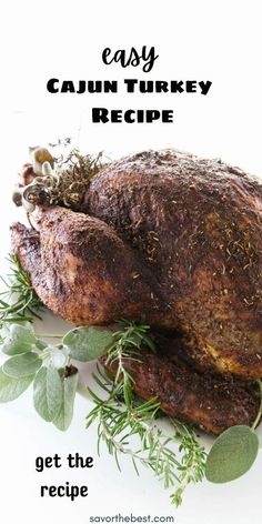 a roasted turkey with herbs on it and the words easy cajun turkey recipe written below