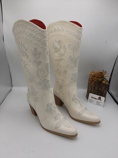 Handembroidery genuine leather custom made women boots. #cowboyboots #leatherboots #suzaniboots #whiteboote #kneehigh #cowgirl #handmade #womenboots #whiteleather #embroideredboots #bootslover #festivalboots #outdoorfit #bemyboots White Leather Boots For Western-themed Events, White Snip Toe Boots For Ranch, White Western Boots For Western-themed Events, White Round Toe Boots For Country Events, White Western Boots For Country Events, White Western Snip Toe Boots, White Western Boots With Snip Toe, White Leather Western Boots, White Bohemian Boots With Round Toe