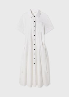 Short sleeve shirt dress in crisp cotton poplin. Striking A-line silhouette. Cuffed sleeve hem with tab. Exposed button closure. Optional drawstring cinch to style this dress in a variety of ways. Midi length. 4873STN-CORE 100% Cotton White True to size. Approx 53" center front body length. Model is 5'10" wears a size Small. Short Sleeve Shirt Dress, Instagram Editor, Cuffed Sleeve, Short Sleeve Dress Shirt, Denim Shoes, Silk Wool, Cotton Viscose, Shirtdress, Cuff Sleeves