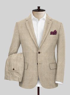 Create a stylish and chic impression with our Highlander Heavy Beige Houndstooth Tweed Suit. Crafted from pure wool fabric, it exudes confidence and expresses your unique individuality through the sophisticated charm of its timeless beige color, complemented by the classic houndstooth pattern. The suit offers a versatile option to make a lasting impact at the office, weddings, and other special occasions. 
  Look Includes    Highlander     Heavy   Beige   Houndstooth     Tweed  Fabric  Two Butto Elegant Tweed Jacket With Houndstooth Pattern, Elegant Houndstooth Tweed Jacket For Tailoring, Elegant Plaid Tweed Jacket For Business Casual, Tailored Houndstooth Tweed Jacket For Business, Tweed Jacket With Houndstooth Pattern For Business Casual, Elegant Tweed Jacket With Houndstooth Pattern And Suit Collar, Luxury Tweed Jacket With Welt Pockets, Elegant Fitted Tweed Jacket With Houndstooth Pattern, Elegant Plaid Tweed Jacket With Suit Collar