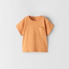 This Zara Basic Short Sleeve Light Orange Pocket Tee Is The Perfect Essential Shirt To Add To Your Little Ones Wardrobe. Zara Short Sleeve Tops With Pockets, Zara Short-sleeved Top With Pockets, Zara Short Sleeve Top With Pockets, Orange Cotton Tops With Pockets, Orange Short Sleeve Tops With Pockets, Zara Orange Short Sleeve Tops, Cute Crew Neck Top With Pockets, Zara Cotton Tops With Pockets, Zara Cotton Top With Pockets