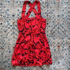 Cross Straps In The Back, Zipper Down The Back, 100% Polyester, Perfect Condition Never Worn. Nwt From Urban Outfitters Red Floral Print Mini Dress For Night Out, Urban Outfitters Floral Print Party Dresses, Urban Outfitters Red Dress For Date Night, Urban Outfitters Red Sleeveless Mini Dress, Urban Outfitters Red V-neck Dress, Sleeveless Red Mini Dress By Urban Outfitters, Red Spring Dress From Urban Outfitters, Chic Red Dress By Urban Outfitters, Urban Outfitters Chic Floral Print Dress