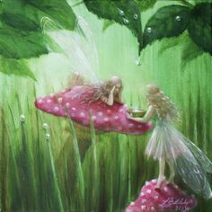 two fairy figurines sitting on top of pink mushrooms in the grass with green leaves