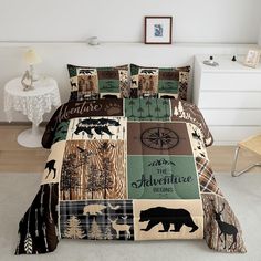 a bed covered in a comforter and pillows with bear images on the coverlet