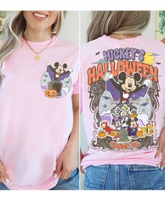 Celebrate Halloween in magical style with our Mickey-themed tee! Featuring everyone's favorite mouse in a bewitching design, this shirt is a must-have for spooky season. Perfect for pumpkin patch adventures or hauntingly fun parties, it's comfy, cute, and full of Disney charm. Get into the spirit with Mickey and make this Halloween one to remember! Disney Halloween T-shirt Pre-shrunk, Disney Halloween Graphic Print T-shirt, Disney Halloween Fan Merchandise T-shirt, Themed T-shirt For Disney Halloween Events, Disney Halloween T-shirt For Fan Events, Disney Halloween Themed T-shirt, Disney Halloween T-shirt With Character Print, Disney Halloween Character Print T-shirt, Disney Crew Neck Top For Halloween