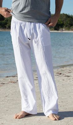 Men's pants Organic cotton Adjustable waist. Baggy Summer Bottoms For Beach, Summer Beach Pants With Baggy Fit, Baggy Beach Bottoms For Beach Season, Straight Leg Cotton Bottoms For Vacation, Cotton Pants With Elastic Waistband For Vacation, Straight Cotton Pants For Vacation, Relaxed Fit Cotton Bottoms For Beach, Cotton Straight Pants For Vacation, Vacation Cotton Pants With Elastic Waistband