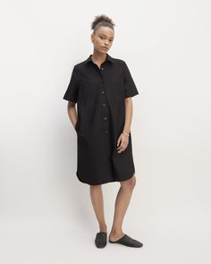 About This Style. This piece features a relaxed fit, point collar, short sleeves, A-line silhouette, and knee length in organic cotton. Classic Spread Collar Shirt Dress For Summer, Classic Shirt Dress With Spread Collar For Summer, Classic Summer Shirt Dress With Spread Collar, Classic Collared Shirt Dress For Summer, Casual Short Sleeve Shirt Dress With Rolled Sleeves, Relaxed Fit Collared Shirt Dress With Pockets, Relaxed Fit Knee-length Shirt Dress With Placket, Relaxed Fit Knee-length Shirt Dress, Relaxed Fit Short Sleeve Work Dresses