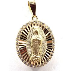 Product Description Other Specifications: Material: Yellow Gold Type Of Pendant: Virgin Of Guadalupe Purity: 14k Size High: 24.0 Mm Size Width: 14.20 Mm Weight: 1.6 G High Quality, Real, Solid 14k Gold, All Our Products Are Stamped And Tested For Authenticity. Shop With Confidence! Oro Solido 14k De Alta Calidad, Todos Nuestros Productios Son Estampados Y Examinados Para Garantizar Autenticidad. Free Gift Box Included / Incluye Cajita De Regalo #14k #Qualityjewelry #Earring #Hoops #Gold #Yellowg Oval Our Lady Of Guadalupe Jewelry Gift, Oval Virgin Mary Jewelry Gift, Oval Yellow Gold Jewelry With Our Lady Of Guadalupe, Yellow Gold Oval Jewelry With Our Lady Of Guadalupe, Yellow Gold Oval Necklace With Our Lady Of Guadalupe, Virgin Of Guadalupe, Earring Hoops, Hoops Gold, Lady Of Guadalupe