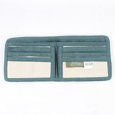 "Your wallet is your smallest accessory, but it can have the greatest vibes. This wallet is made of cotton canvas, making it durable and flexible. It has a full-length pocket perfect for bills and checks, and has smaller pockets that snugly fit your ID and cards. The Mushroom print is printed in an ombre style. Pair with a boho bag for a complete look of good vibes. Details: 100% Cotton 4\" high X 9\" wide (open) 4\" high x 4 1/2\" wide (folded) Made in Nepal" Mushroom Print, Rainbow Magic, Ombre Fashion, Canvas Making, The Mushroom, Belt Pouch, Boho Bag, Bifold Wallet, Small Accessories