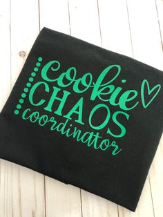 Who's ready for cookie chaos?! Here's to another wonderful year of hard work and dedication to our Girl Scouts! 💗 Writing is in blush pink glitter! Also available in other colors! Girl Scout Cookie Shirts Ideas, Girl Scout Troop Shirts, Girl Scout Shirts, Scouting For Girls, Rally Idea, Cookie Booth, Girl Scout Cookie Sales, Girl Scout Cookies Booth, Girl Scout Troop Leader