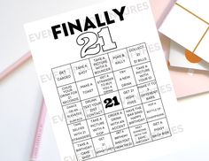 a printable game for the 21st birthday party is displayed next to some stationery items