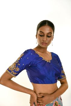 Royal Blue Silk Blouse with Heavy Embroidery Work on the Sleeves Elegant Art Silk Choli With Floral Embroidery, Elegant Silk Choli With Resham Embroidery, Elegant Designer Choli With Floral Embroidery, Elegant Tissue Silk Blouse With Floral Embroidery, Elegant Silk Choli With Intricate Embroidery, Elegant Traditional Wear With Floral Embroidery For Reception, Reception Blouse With Intricate Embroidery In Tissue Silk, Semi-stitched Satin Blouse Piece With Resham Embroidery, Designer Satin Blouse Piece With Resham Embroidery