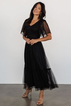 Elevate your allure with our Martha Smocked Tulle Dress in classic black, a charming and elegant choice that exudes timeless beauty. This dress, featuring delicate smocking and a beautiful blue hue, ensures you make a lasting impression with your sophisticated style. Tulle Dress Black, Velvet Prom Dress, Tulle Material, Embellished Maxi Dress, Tulle Sleeves, Baltic Born, Black Tie Gala, Grad Dresses, Mom Dress