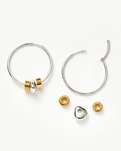 Abacus Beaded Medium Charm Hoop Earrings | 18ct Recycled Gold Vermeil and Rhodium on Sterling Silver Mixed Metal. Mix Up Your Metals. These Medium-Sized Hoops Feature a Combination of Removable Gold Hexagonal, Ridged and Organic-Inspired Beads. Wear Multiple Ways by Changing Up the Order of Beads, or Go for a Maximalist Look by Stacking with Your Favourite Studs and Mini Hoops. The Removable Beads Can Also be Worn on Your Favourite Chain. Hoop Metal: Rhodium on Sterling Silver Charm Metal: 18Ct Trending Bracelets, Jewelry Bracelets Silver, Earring Trends, Classy Jewelry, Engraved Jewelry, Recycled Gold, Enamel Jewelry, Gemstone Bracelets, Sterling Silver Charm