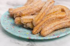 some kind of fried food on a blue plate