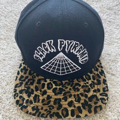 Black Pyramid Hat New Without Tags. Never Been Worn. Includes Adjustable Strap For Custom Fit Blue Aviator Sunglasses, Black Pyramid, Small Sunglasses, Free People Bags, Asics Running Shoes, Nike Air Max Tn, Swim Shoes, Trending Sunglasses, Metal Sunglasses