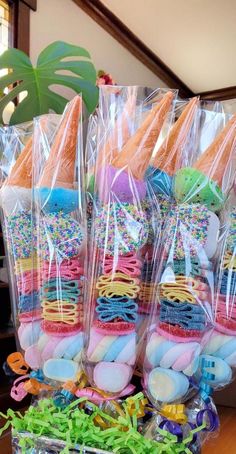 there are many colorful treats wrapped in plastic