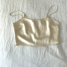 Brand New, Never Worn. Classy And Sexy, Pair With Jeans Or A Skirt For A Night Out Elegant Summer Vest Crop Top, Silk Cami Top With Built-in Bra, Fitted Crop Top Camisole With Built-in Bra, Elegant Tank Crop Top, Silk Tank Top With Built-in Bra For Spring, Fitted Silk Camisole With Built-in Bra, Summer Silk Tank Top With Built-in Bra, Elegant Tank Crop Top For Night Out, Chic Fitted Bra-friendly Tank Top