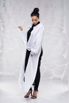 "White Tunic Women, White Shirt Tunic, Plus Size Clothing ♛ All of Rosche's pieces are created with the sole purpose that YOU feel beautiful! Enjoy unique details in combination with high-quality materials every day and make an statement every place you go! ♛ Perfect for every occasion! The black loose dress is available here : https://www.etsy.com/listing/690664041/maxi-dresskaftan-dresscaftan-dressplus?ref=shop_home_active_4&pro=1 ♛ Sizes: Check the size chart below ♛ Materials & Care: Fitted White Wrap Blouse, White Fitted Wrap Blouse, Fitted White Long Sleeve Tunic, Fitted White Tunic Blouse, White Fitted Tunic Blouse, Black Loose Dress, White Futuristic, White Tunic Shirt, Loose Black Dress