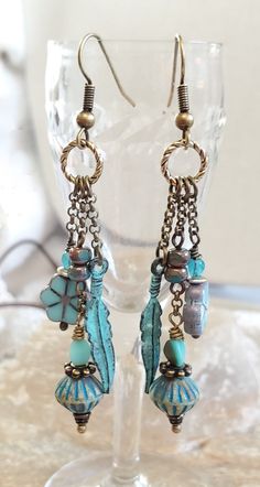 Boho Feather Earrings, Blue Czech Glass Earrings, Boho Blue Flower Earrings, Blue Feather Earring, Ladies Boho Earring, Rustic Boho Earrings - Etsy Blue Bohemian Dangle Earrings, Blue Bohemian Jewelry With Dangling Charms, Adjustable Blue Bohemian Earrings, Blue Bohemian Earrings For Pierced Ears, Unique Blue Earrings For Festival, Blue Jewelry With Dangling Charms, Bohemian Blue Nickel-free Earrings, Bohemian Blue Metal Earrings, Blue Bohemian Metal Earrings